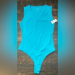 NWT. V neck bodysuit.